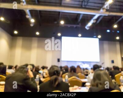 Blurry image in conference room. Abstract blurred people lecture and discussion in seminar room or conference room ,business concept. Stock Photo