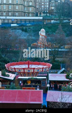 Helter Skelter and Carousel in East Princes Street Gardens. Edinburgh Christmas Market and Fair. Scotland Stock Photo