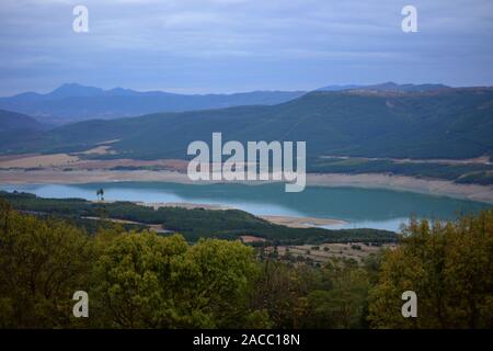 Wonderful views of the lake that forms in the surroundings of the river Aragon in the dam of Yesa. Stock Photo
