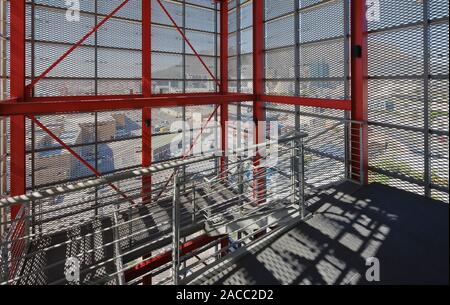 Open stairwell in Silo 3 with metal screens. Silo District Cape Town, Cape Town, South Africa. Architect: VDMMA, 2019. Stock Photo