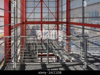 Open stairwell in Silo 3 with metal screens. Silo District Cape Town, Cape Town, South Africa. Architect: VDMMA, 2019. Stock Photo