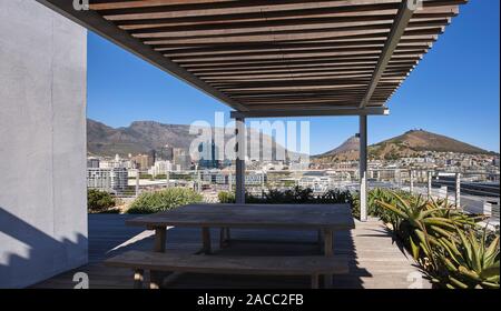 Communal rooftop terrace with view towards Table Mountain. Silo District Cape Town, Cape Town, South Africa. Architect: VDMMA, 2019. Stock Photo