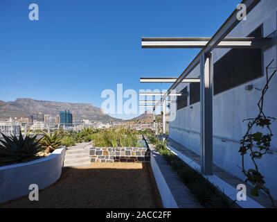 Communal rooftop terrace with view towards Table Mountain. Silo District Cape Town, Cape Town, South Africa. Architect: VDMMA, 2019. Stock Photo