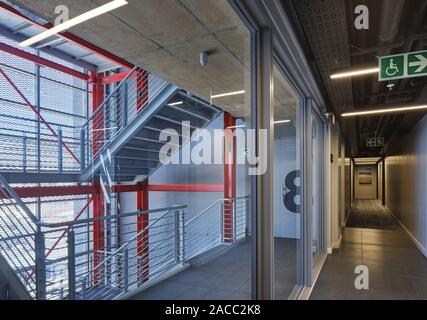 Open stairwell in Silo 3 with metal screens. Silo District Cape Town, Cape Town, South Africa. Architect: VDMMA, 2019. Stock Photo