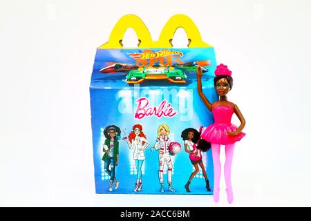 McDonald's Happy Meal cardboard box with Mattel Barbie doll. McDonald's is a fast food restaurant chain. Stock Photo