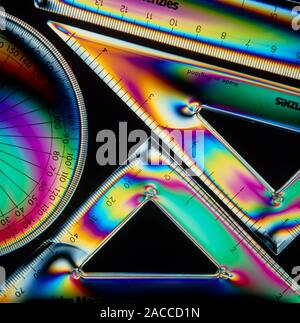 Stress patterns in plastic geometry instruments revealed by photopolarimetry. When plastic objects are manufactured, internal stresses may build up. T Stock Photo