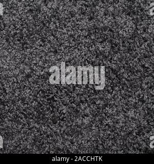 gray shaggy deep-pile carpet background texture Stock Photo