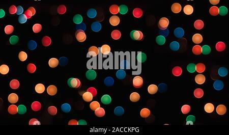 multicolored circles on a black background with blur abstract pattern Stock Photo