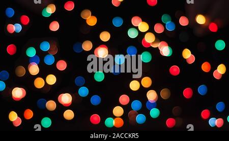 multicolored circles on a black background with blur abstract pattern Stock Photo