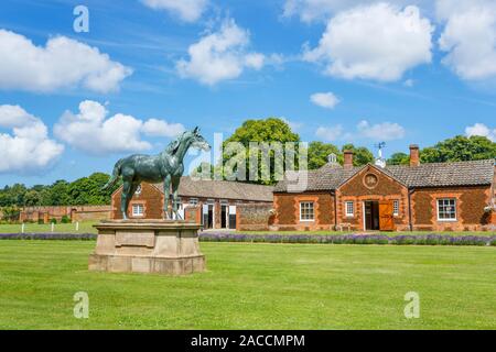 Statue of the racehorse Persimmon at The Queen's stables, The Royal Stud at Home Farm on the Sandringham Estate, Norfolk, UK Stock Photo