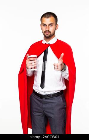 Businessman dressed like superhero drinking coffee Stock Photo