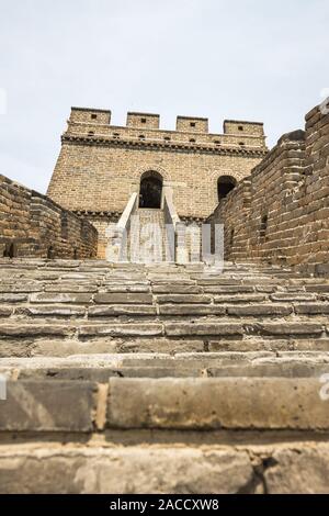 Photo below, from the corner, stone building, Great Wall of China, China. Stock Photo