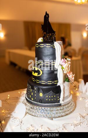 A Stunning Traditional But Fun Batman Wedding Cake A Half And Half Cake Made For The Special Wedding Occasion Tasty And Elegant Stock Photo Alamy