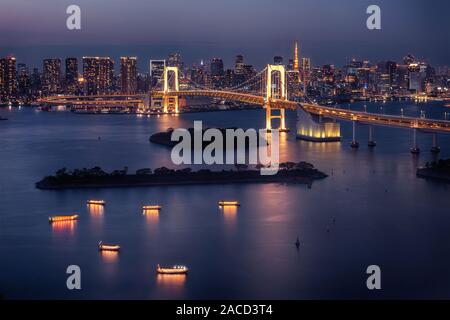 Tokyo skyline with Tokyo Tower and Rainbow Bridge at night in Japan Stock Photo