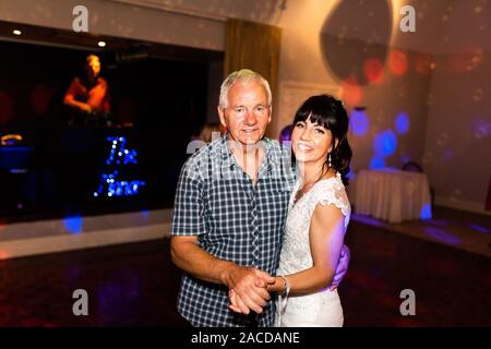 People dance and enjoy themselves at a wedding reception, after party at the Manor Hotel and Guest House, Cheadle, Grade 2 listed Wedding Venue Stock Photo