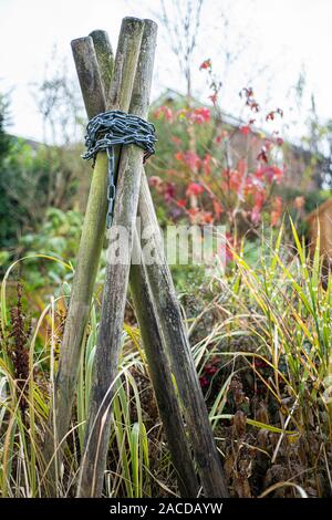 Garden Structure, wooden four post structure with chains wrapped around ...