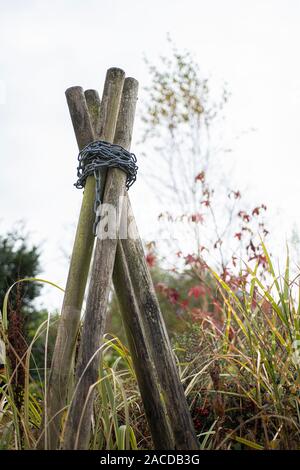 Garden Structure, wooden four post structure with chains wrapped around ...