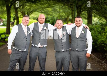 Groom & Best Men have wedding pictures at Floral Hall, Tunstall Park, Stoke on Trent, Wedding photography, celebration, traditional English wedding Stock Photo