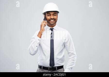 indian male architect calling on smartphone Stock Photo