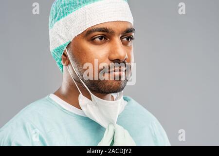 face of doctor or surgeon with protective mask Stock Photo