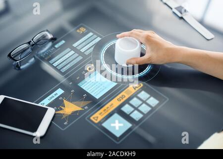 hand with control knob on interactive panel Stock Photo