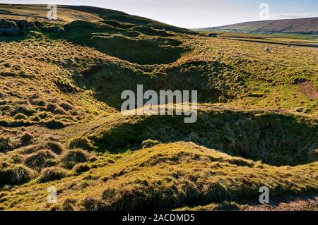 Shaft hollows on Faucet Rake near Oxlow Caverns, Castleton Stock Photo