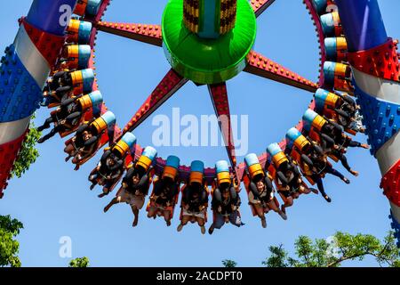 Young People On A Fairgound Ride In The People’s Park, Yangon, Myanmar. Stock Photo