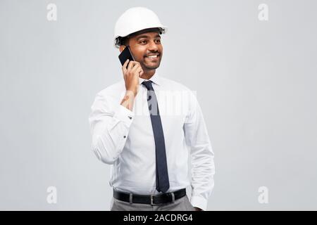 indian male architect calling on smartphone Stock Photo