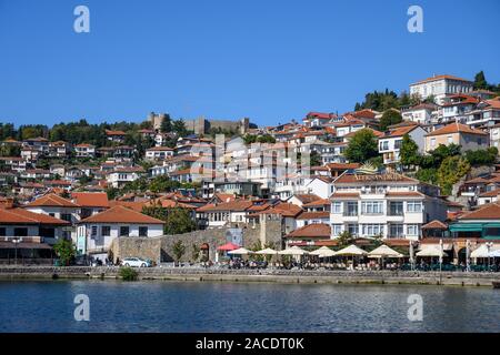 Looking across the harbour to the Old city of Ohrid on the shore of Lake Ohrid  in North Macedonia,   Europe. Stock Photo