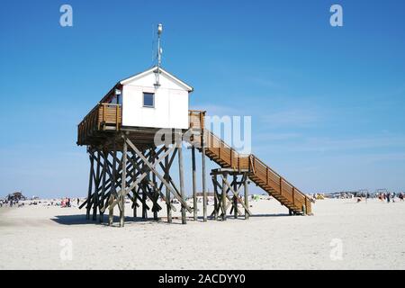 beach stilt house or building on stilts at German seaside resort St. Peter-Ording or SPO Stock Photo