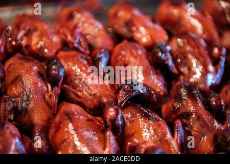 Fried pigeons in a food market in Beijing, China. Stock Photo