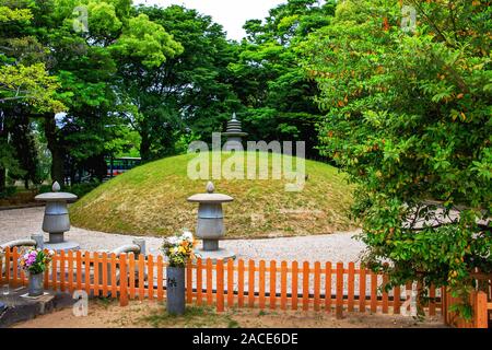 Atomic Bomb Memorial Mound containing the ashes of people cremated in the atomic blast, Peace Memorial Park, Hiroshima, Japan Stock Photo