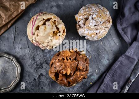 Different flavors of ball shaped traditional German sweet food called 'Schneeballen', meaning 'Snowball', made from shortcrust pastry, a speciality fr Stock Photo