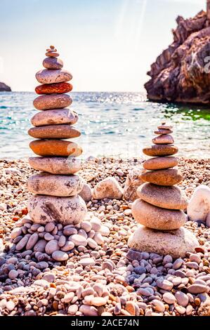 Stacking Rocks on the beach, This is almost a pastime in th…