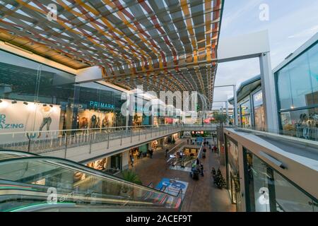Palma de Mallorca, Spain - December 2, 2019:  View of the fashion shopping mall FAN Mallorca during the Christmas campaign. Several outfit shops such Stock Photo