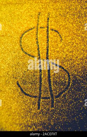 Dollar sign on golden shiny background, gold bar. Stock Photo