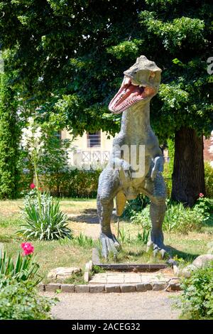 Tyrannosaurus rex statue in Park of Natural History museum standing on hind legs, mouth open. Sibiu, . Stock Photo