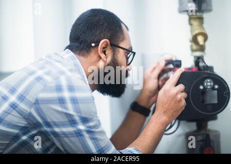 heating engineer checking system Stock Photo