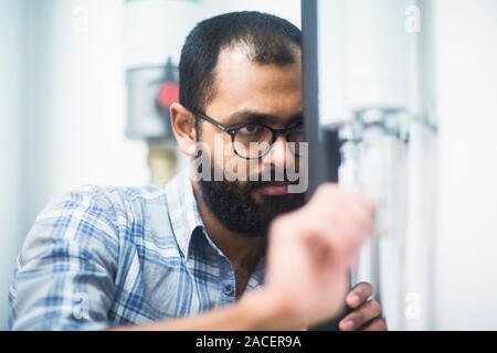 heating engineer checking system Stock Photo