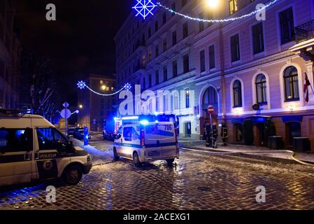 RIGA, LATVIA. 1st December 2019. Emergency rescue services; firefighters and police near building, where member's of  Latvian Parliament Artuss Kaimins appartment was in fire. Stock Photo