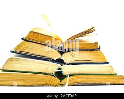 A stack of old books with place for text on a white background. Yellow Pages. Free place. Background image. Stock Photo