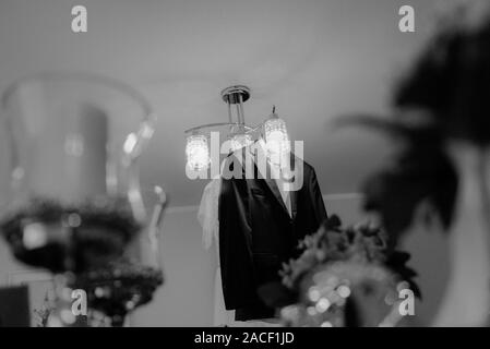 Groom's wedding accessories. Bow tie, suit, cufflinks, belt and shoes Stock Photo