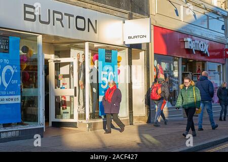 Busy TK Maxx retail clothing business shoppers & red shop front in the UK  Stratford Westfield shopping centre Mall T K Maxx store sign above entrance  Stock Photo - Alamy