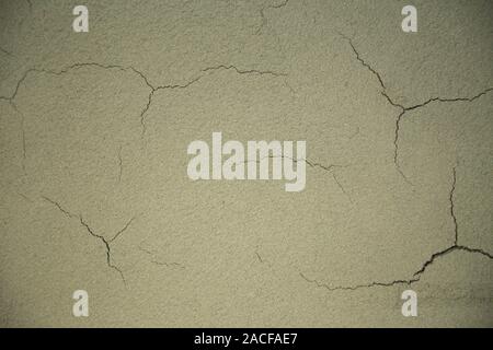 Close up of fresh dried lime plaster cracking. Lime plaster is an ecological alternative without any chemical additives Stock Photo