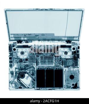 Laptop. Coloured X-ray of a laptop, showing its internal structure. Stock Photo