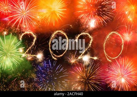 2020 made with sparklers on black background Stock Photo