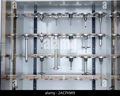 3D measurement machine probes. Rack containing various probe heads for a coordinate measurement machine. The machine is capable of accurate 3D measure Stock Photo
