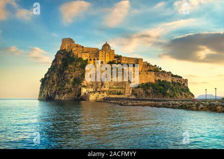 Ischia island and Aragonese medieval castle or Ischia Ponte. Travel destination near Naples in Campania, Italy. Europe. Stock Photo
