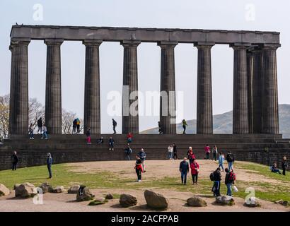 National Monument of Scotland with tourists, Calton Hill, Edinburgh, Scotland, UK Stock Photo