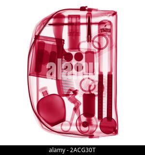Bag. Coloured X-ray of a bag containing various personal grooming items. Stock Photo